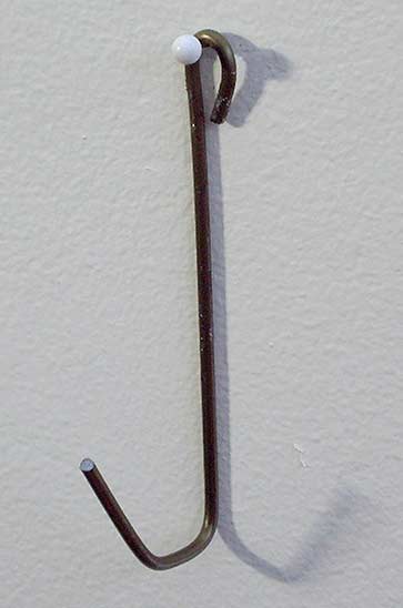 Joan Anderson useful scultpture with wire and found objects.